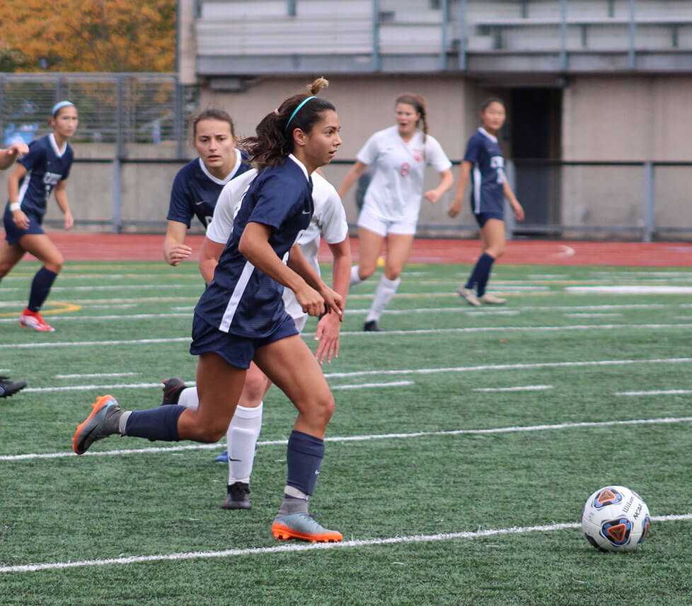 Photo of a Case Western Reserve University women’s soccer player on the field during a game